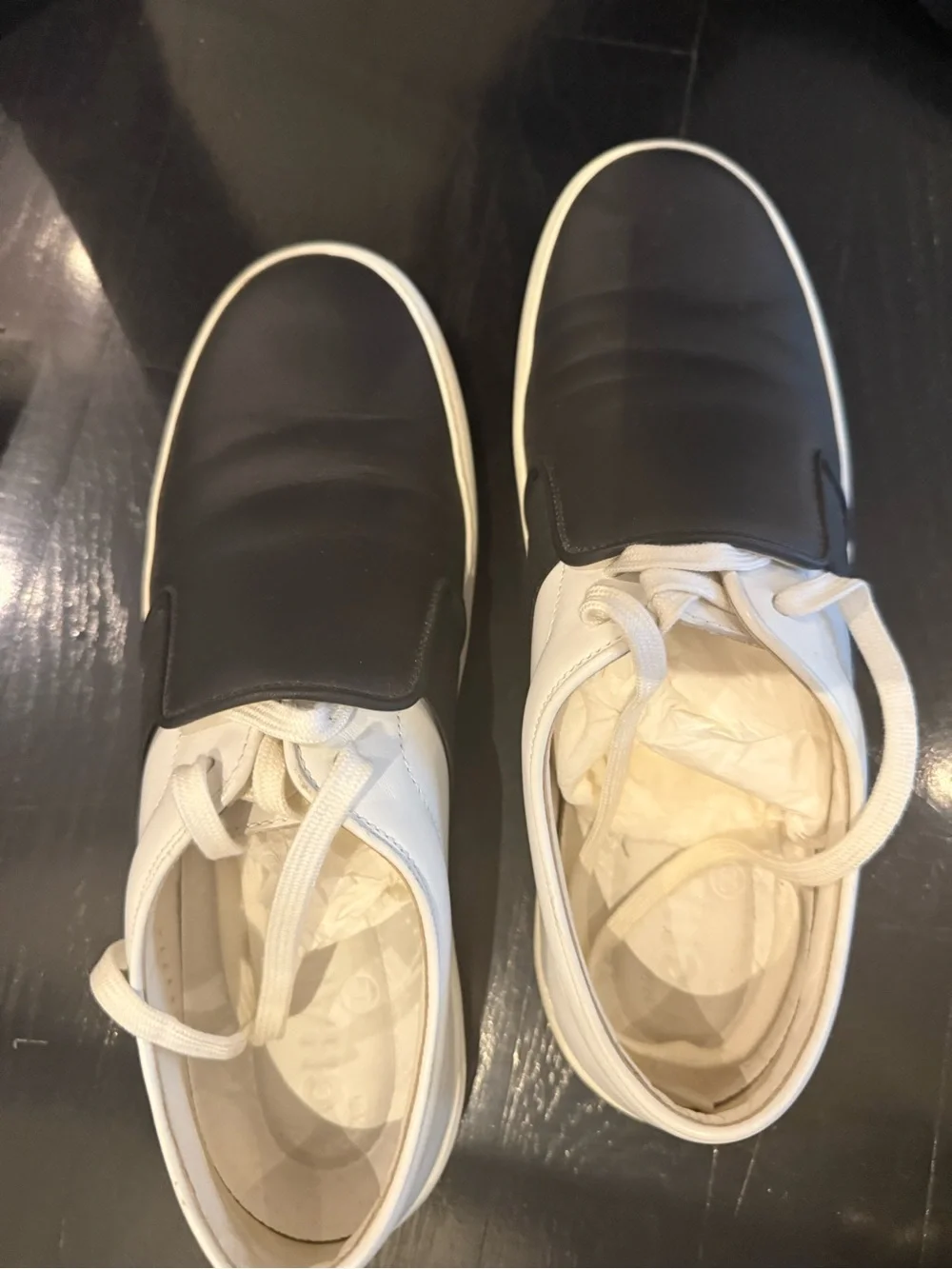 CHANEL Black and White Leather Slip-On Sneakers with laces